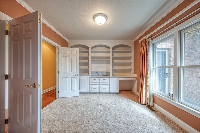 Den can easily be separated from master bedroom | Image 30