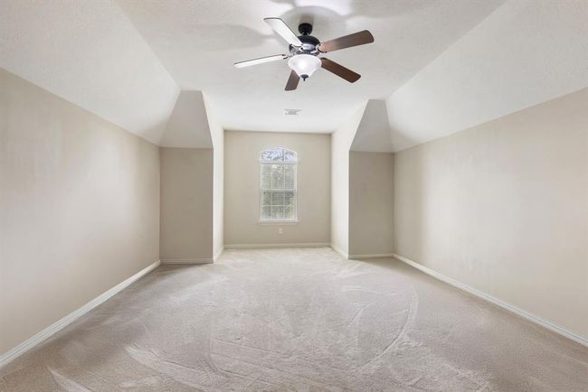 1 of 3 bedrooms on 2nd floor. Unique cut out with center window would be great with bench or built-in. | Image 31