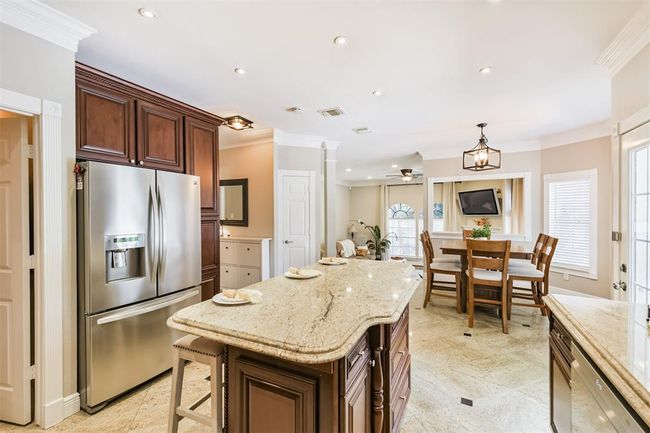 Modern stainless steel refrigerator included. | Image 14