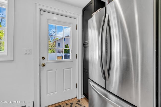 adjacent pantry and nook for the refrigerator | Image 16