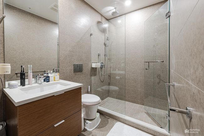 Full bath with visible vents, a shower stall, toilet, and vanity | Image 17