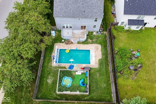 view of subject property with a pool area | Image 51