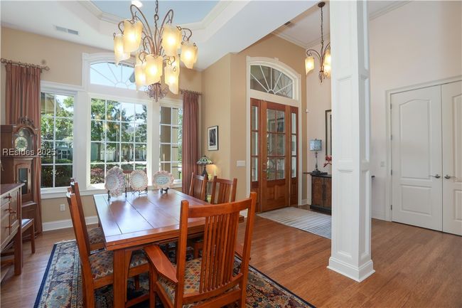 View of dining area and foyer. | Image 12