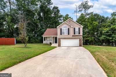 5849 Amerson Lane, House other with 3 bedrooms, 2 bathrooms and 2 parking in Ellenwood GA | Image 2