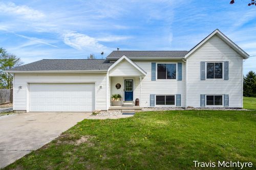 75 Cleveland St E, Coopersville, MI, 49404-9463 | Card Image