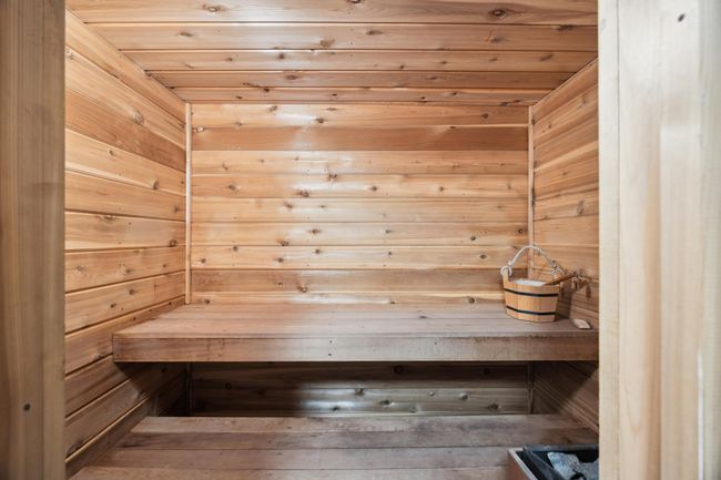 Sauna connected to bath with shower on lower level. | Image 22