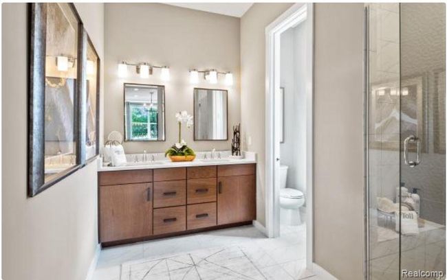 Primary bath with dual sink vanity and luxe shower | Image 8
