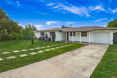 442 El Dorado Parkway E, House other with 4 bedrooms, 3 bathrooms and null parking in Cape Coral FL | Image 1