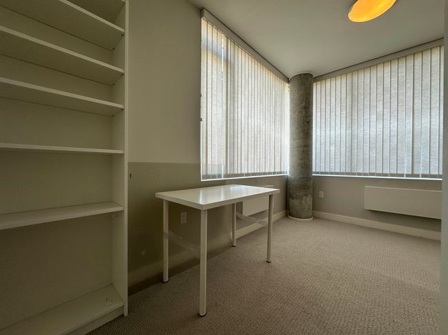 Unfurnished office with carpet and baseboards | Image 9