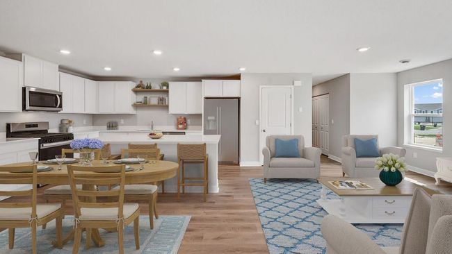Stainless steel appliances, stone counters, and LVP flooring create a worry free home! Photo of actual home! | Image 4