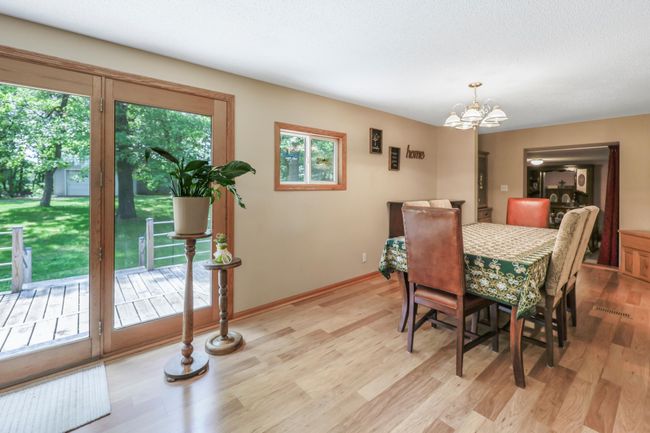 dining room with sliding door to deck/backyard | Image 11