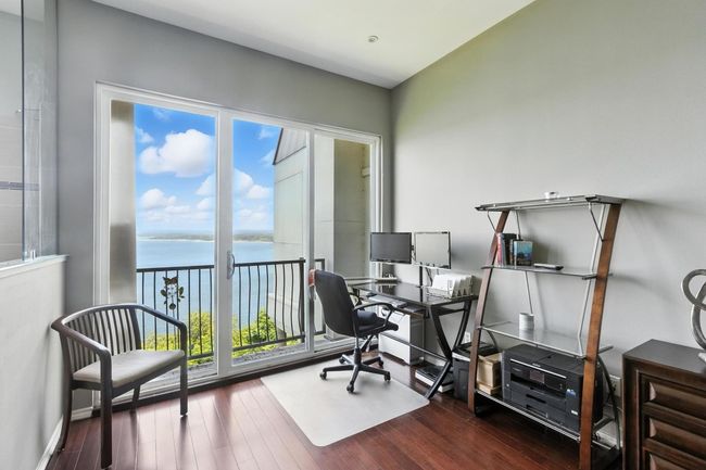 Office area with wood finished floors | Image 19