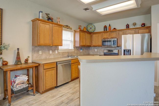 8747 Feather Trl, House other with 4 bedrooms, 3 bathrooms and null parking in Helotes TX | Image 18