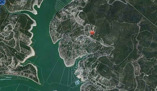 Aerial view shows lot in relation to Sandy Creek arm of Lake Travis | Image 10