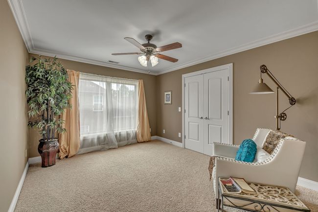 One of three second-floor bedrooms with lots of natural light. | Image 30