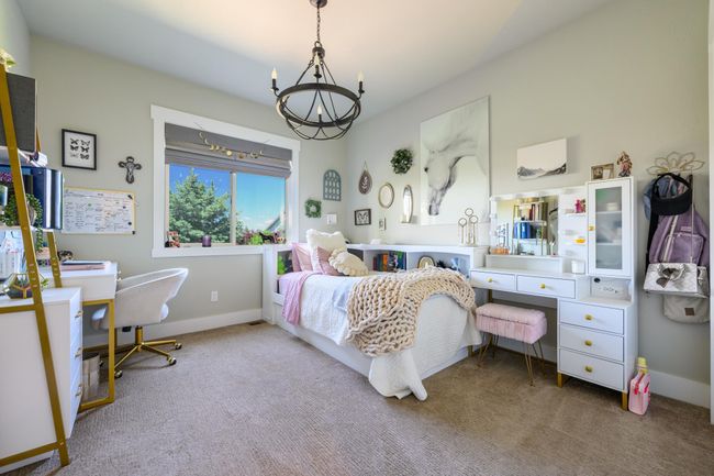 Bedroom 3 featuring carpet, a chandelier | Image 25