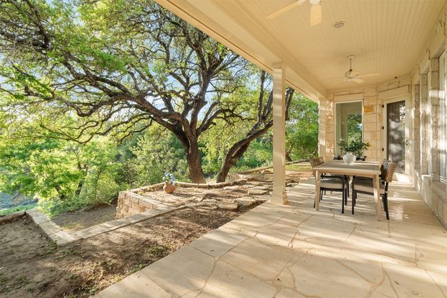 View of patio / terrace with outdoor dining area and ceiling fan | Image 29