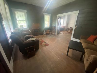 Living room featuring hardwood flooring | Image 2