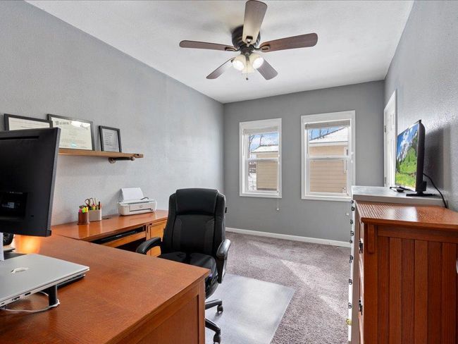 Main floor bedroom currently used as office space | Image 16