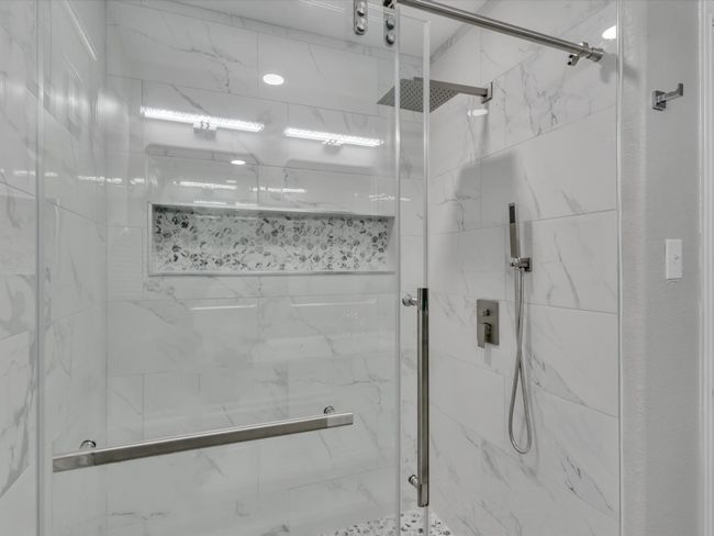 Bathroom featuring a marble finish shower | Image 20