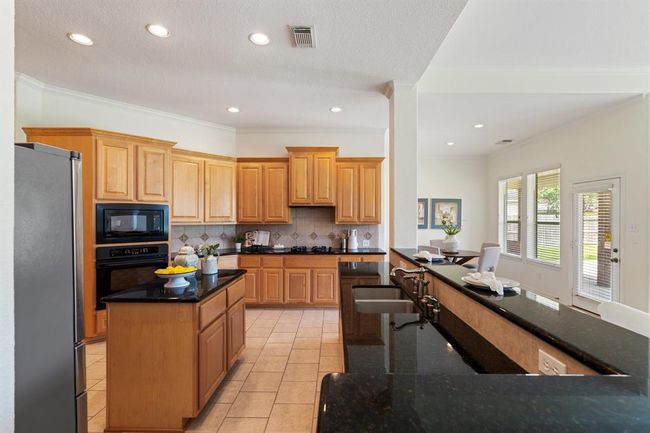 Enjoy this kitchen made for entertaining. | Image 9