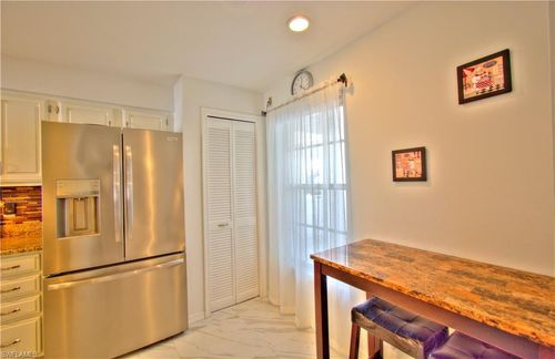 b306-9590 Victoria Ln, NAPLES, FL, 34109 | Card Image