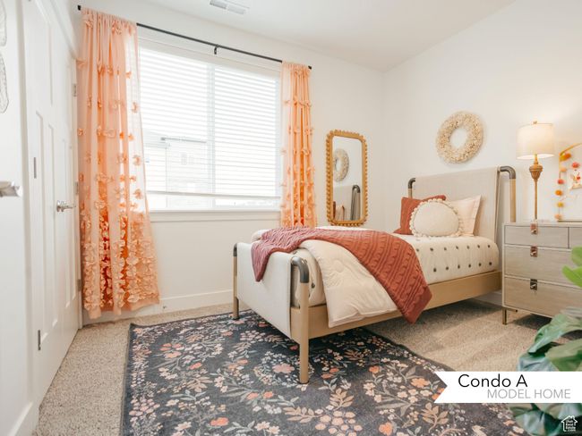Bedroom with baseboards and visible vents | Image 13