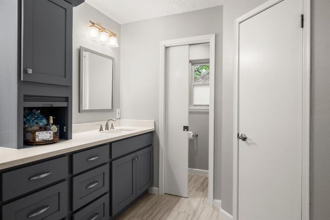 Pocket doors are found throughout the home enhancing flow and functionality while maximizing space and maintaining a clean, seamless look. | Image 29