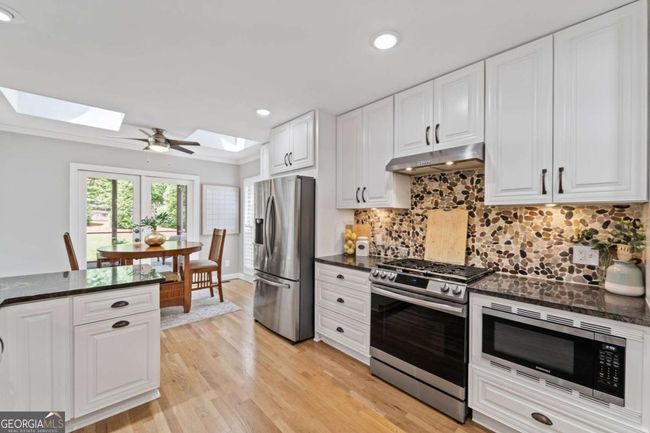 11155 Highfield Chase Dr, House other with 5 bedrooms, 3 bathrooms and 2 parking in Johns Creek GA | Image 14