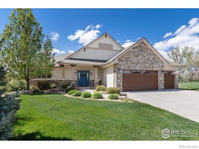 883 Skipping Stone Court, House other with 5 bedrooms, 2 bathrooms and 3 parking in Timnath CO | Image 2