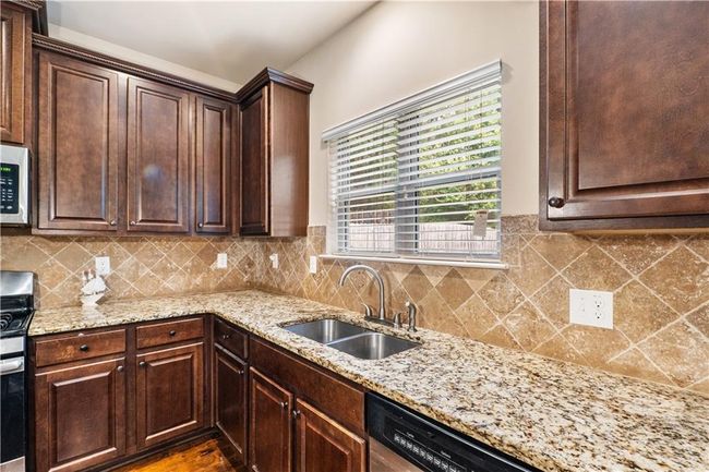 7946 White Oak Loop, House other with 5 bedrooms, 4 bathrooms and 2 parking in Stonecrest GA | Image 8