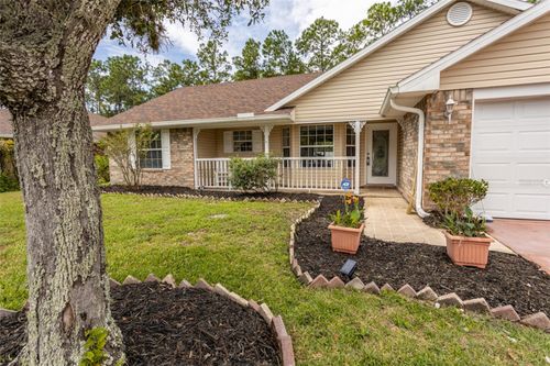 55 Woodlawn Dr, Palm Coast, FL, 32164-7915 | Card Image