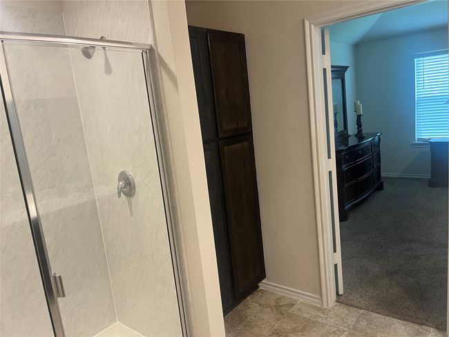 Bathroom with a stall shower | Image 13