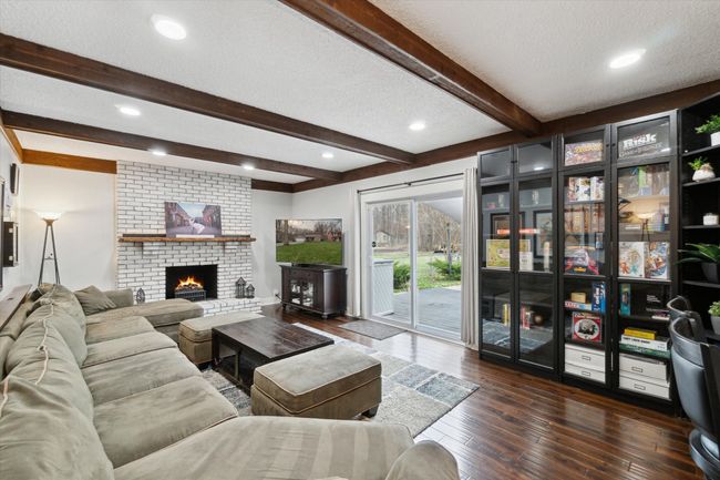 Family room with door wall to deck | Image 21