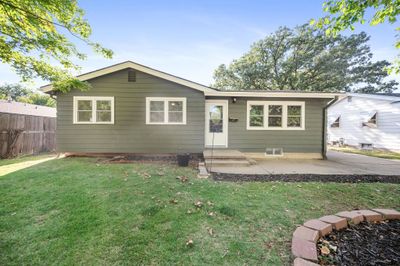 View of front of property featuring a patio and a front lawn | Image 1