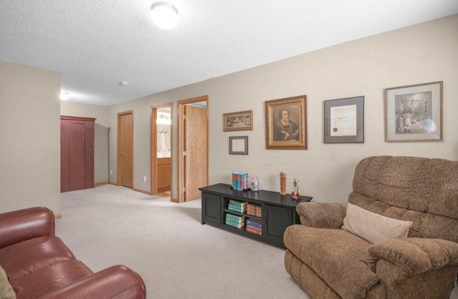 Living Room is spacious only a few stairs away from the kitchen. | Image 18