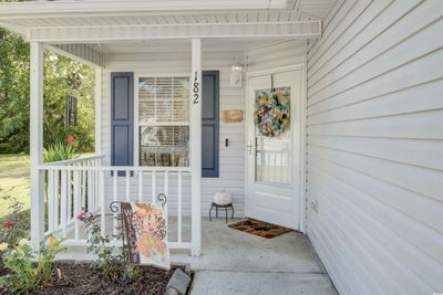 Doorway to property featuring covered porch | Image 3