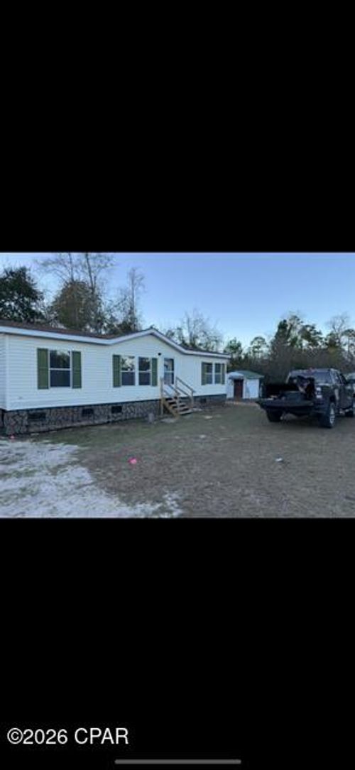 1105 13th St, Southport, FL, 32409-5066 | Card Image