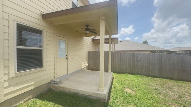 View of yard featuring a ceiling fan | Image 7