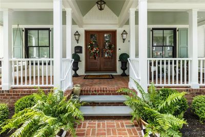 Brick walkway, bluestone steps up to full front porch | Image 2