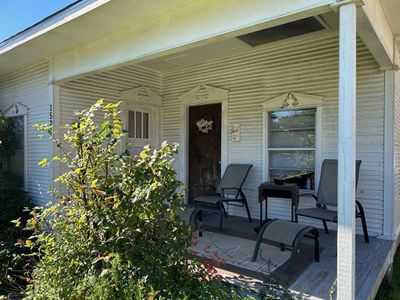 Front porch with door to left side unit and door to right side unit. | Image 2