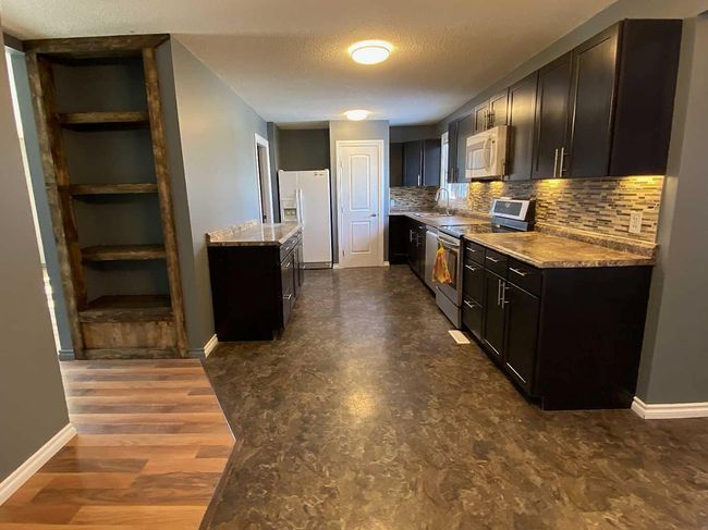 5620 50 Avenue S, House other with 6 bedrooms, 3 bathrooms and 2 parking in Killam AB | Image 12