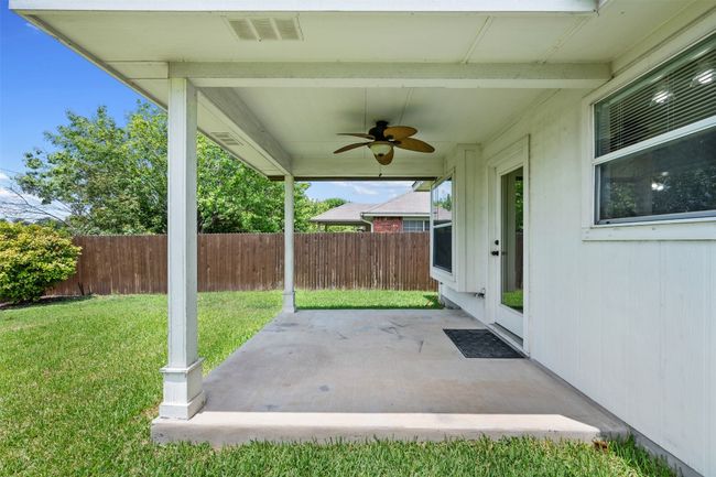 View of patio with a ceiling fan | Image 23