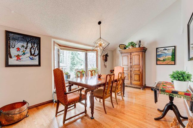 324 Coach Grove Place Sw, Home with 4 bedrooms, 3 bathrooms and 4 parking in Calgary AB | Image 8