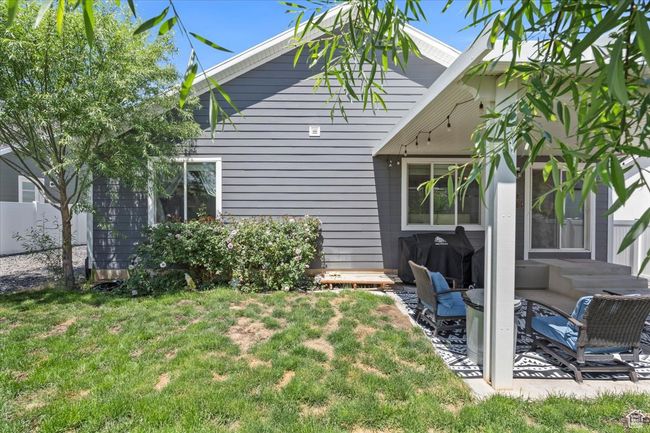 Rear view of house featuring a patio | Image 28