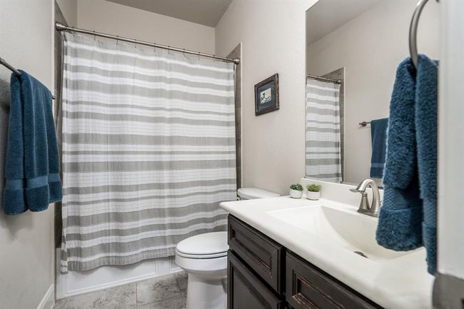 1st of 3 full baths. | Image 9