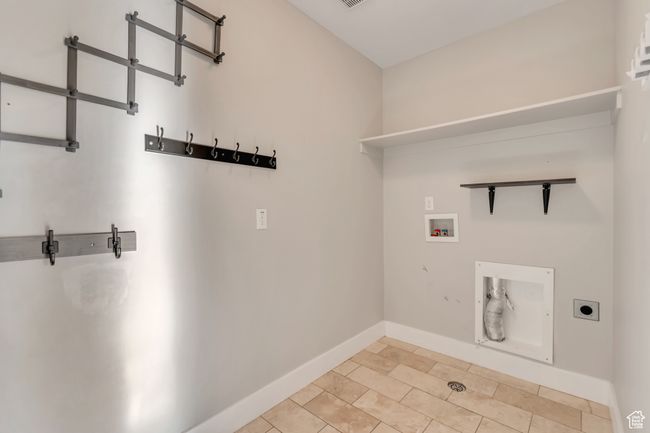 Main level laundry room/ mud room. | Image 13