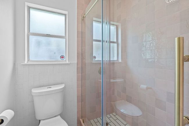 Full bathroom featuring a shower stall | Image 30