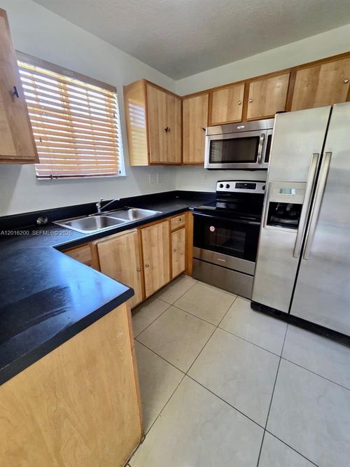 1-103-2170 Ne 167th St, North Miami Beach, FL, 33162-3446 | Card Image