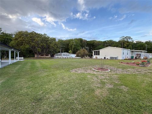 408 Sandalwood Ln, WILDWOOD, FL, 34785-8912 | Card Image